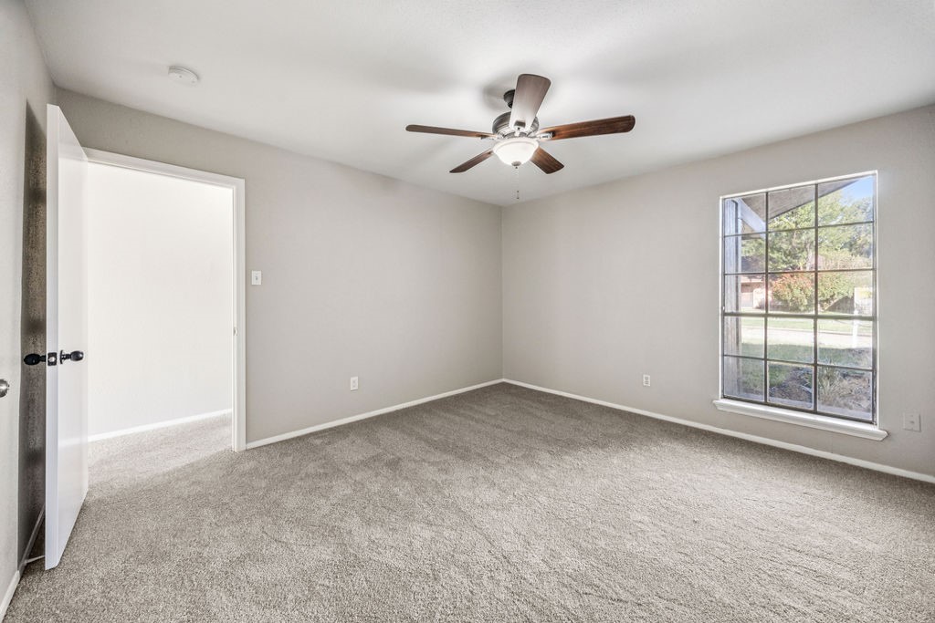 5602 Bridgegate Drive Spring, TX 77373 - Photo 8 of 17 a view of an empty room with a window