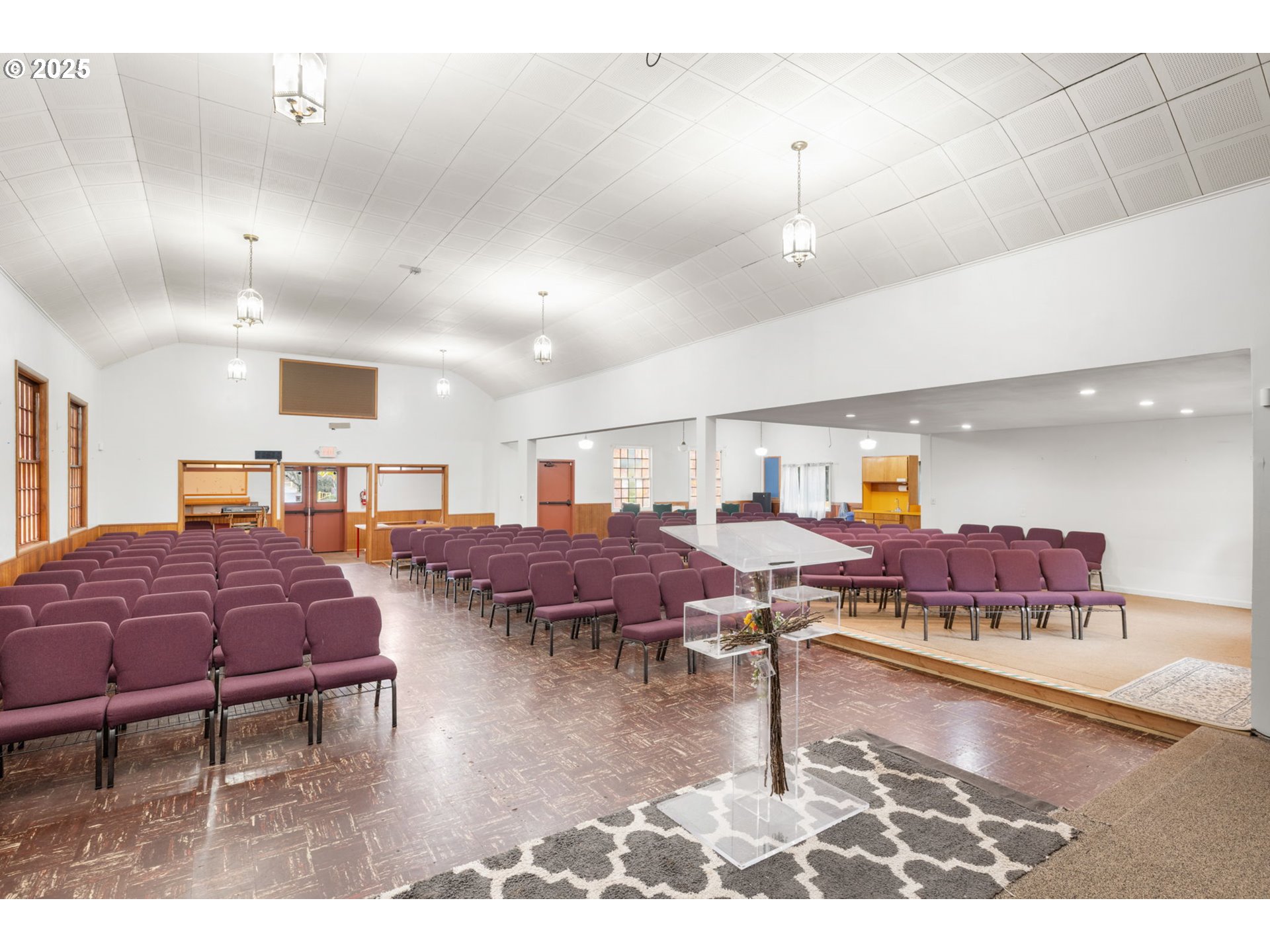 13047 Southeast Ramona Street Portland, OR 97236 - Photo 11 of 48 a living room with lots of furniture and a wooden floor