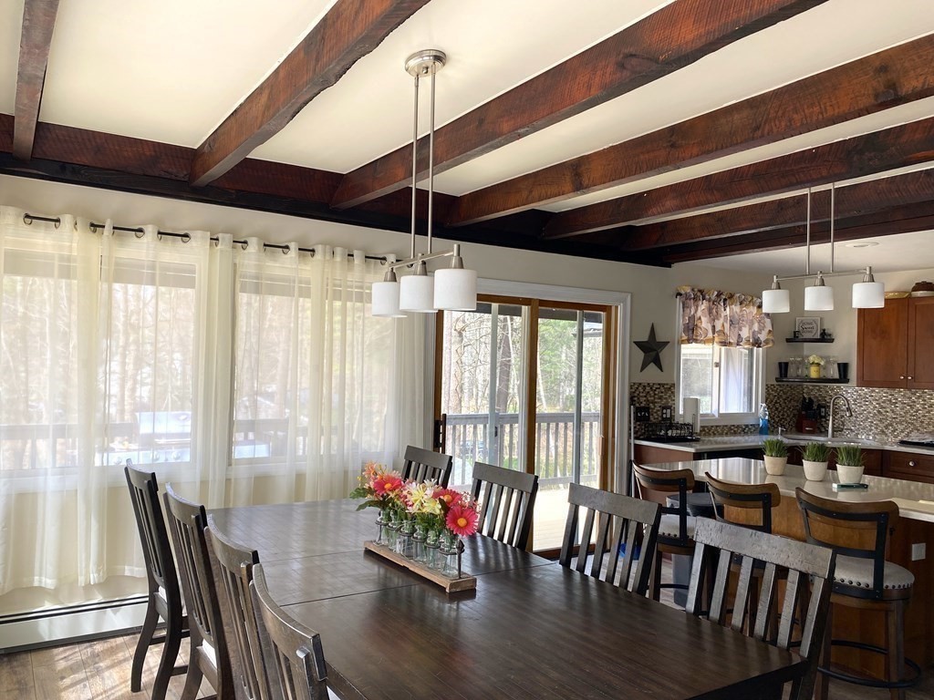 95 Franklin Street Douglas, MA 01516 - Photo 14 of 40 a view of a dining room with furniture window and wooden floor
