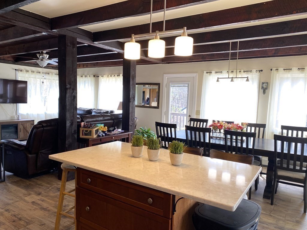 95 Franklin Street Douglas, MA 01516 - Photo 17 of 40 a view of a dining room with furniture window and wooden floor