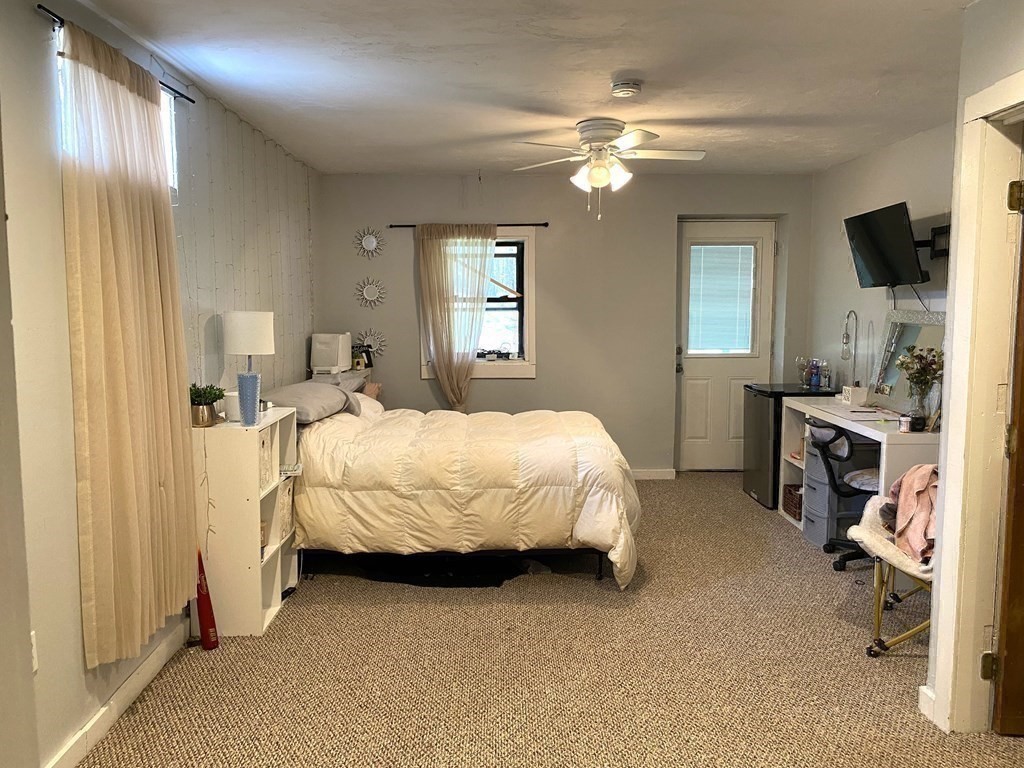 95 Franklin Street Douglas, MA 01516 - Photo 32 of 40 a bed room with a bed and a television