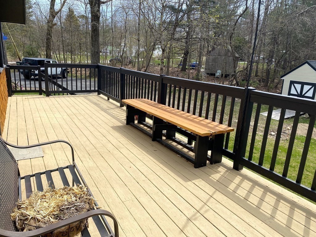 95 Franklin Street Douglas, MA 01516 - Photo 4 of 40 a view of a chairs setting on the roof deck