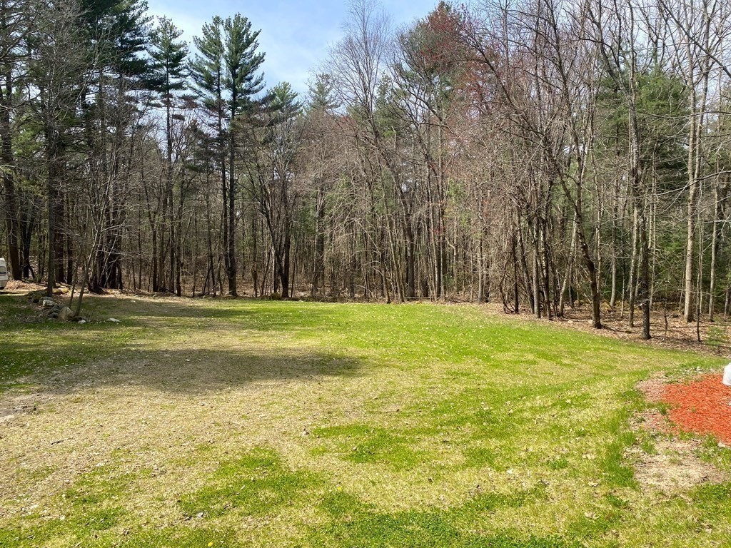 95 Franklin Street Douglas, MA 01516 - Photo 5 of 40 a swimming pool with outdoor seating and yard