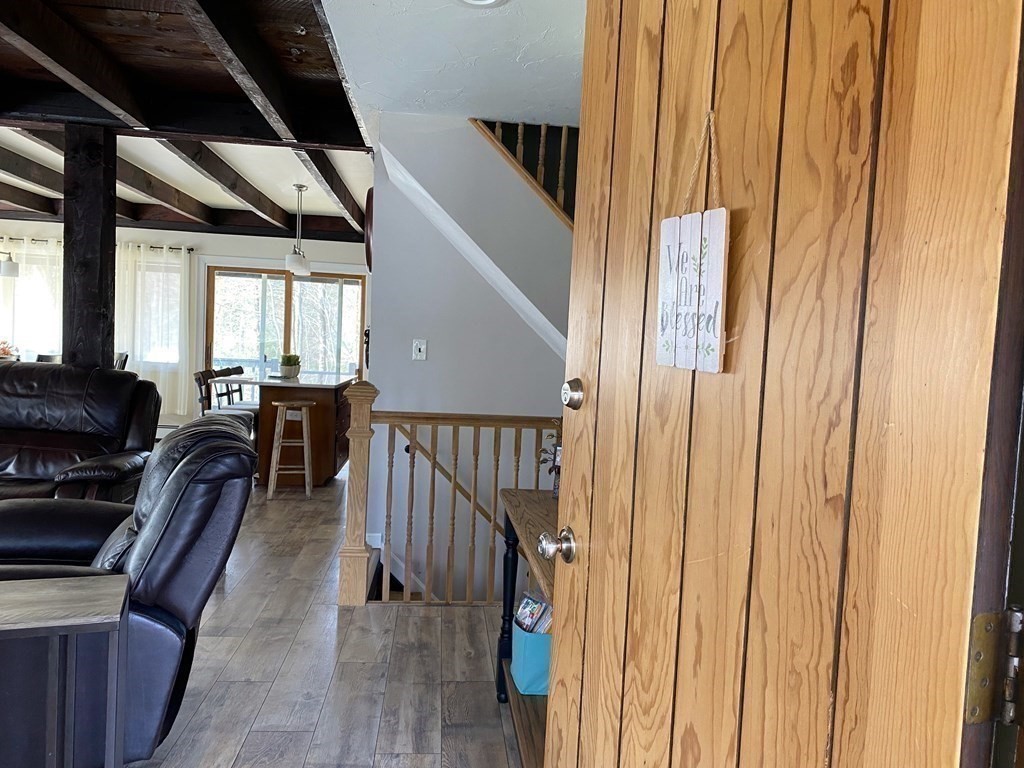 95 Franklin Street Douglas, MA 01516 - Photo 10 of 40 a view of a hallway with couches and chandelier