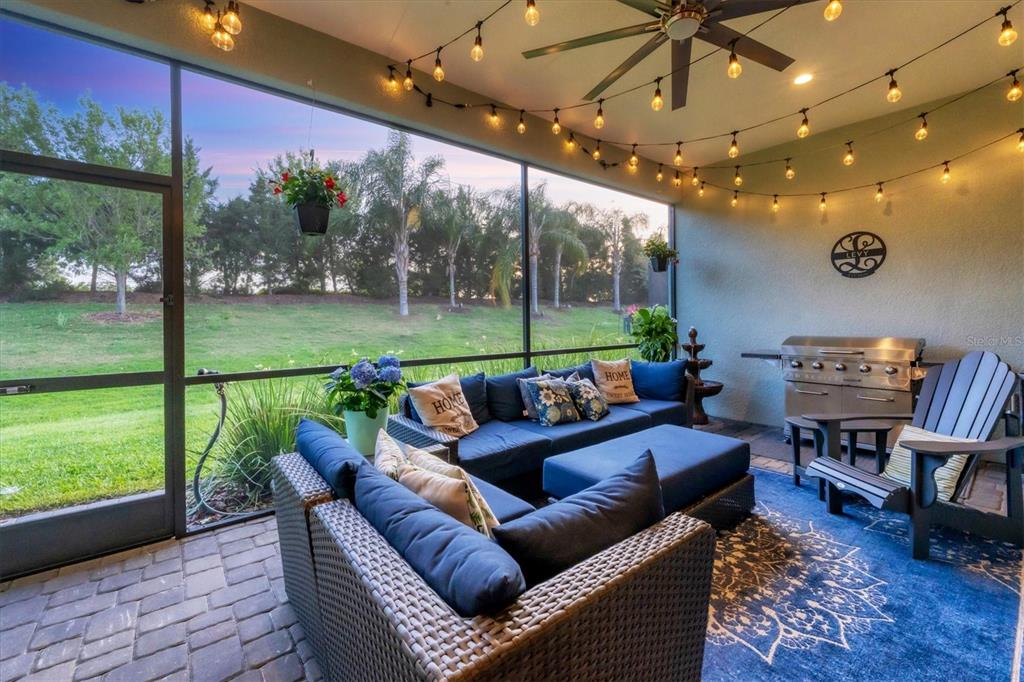 13306 Deep Blue Place Bradenton, FL 34211 - Photo 44 of 73 a outdoor living space with furniture and garden view