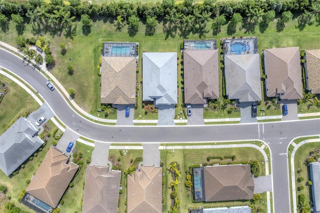 13306 Deep Blue Place Bradenton, FL 34211 - Photo 49 of 73 an aerial view of residential house with outdoor space and swimming pool