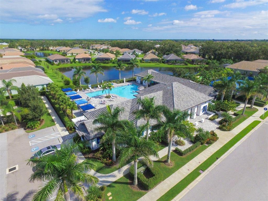 13306 Deep Blue Place Bradenton, FL 34211 - Photo 69 of 73 an aerial view of a house with a garden and lake view