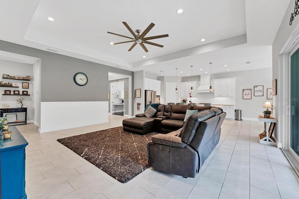 13306 Deep Blue Place Bradenton, FL 34211 - Photo 9 of 73 a living room with furniture and a rug