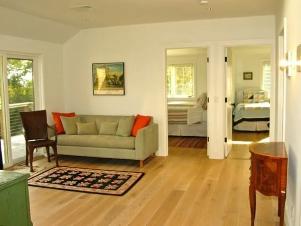 a living room with furniture and a table