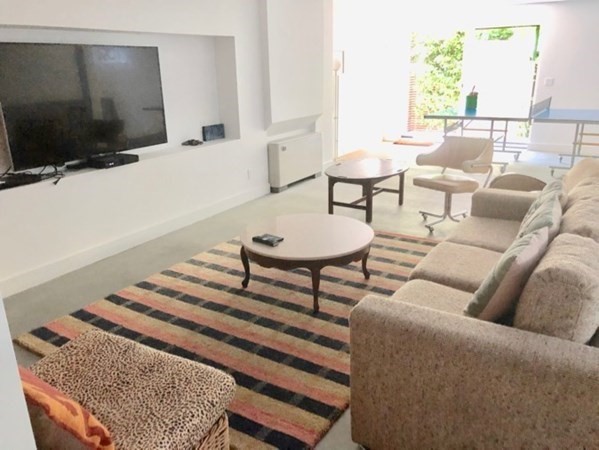 60 Witchwood Lane Edgartown, MA 02539 - Photo 25 of 32 a living room with furniture and a flat screen tv