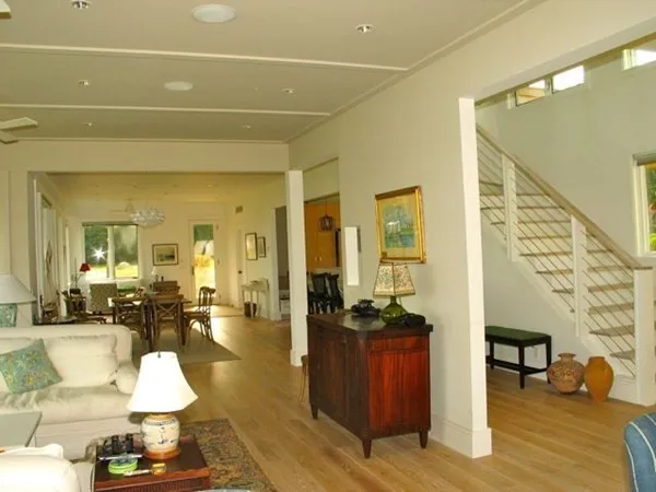 a lobby with furniture and wooden floor