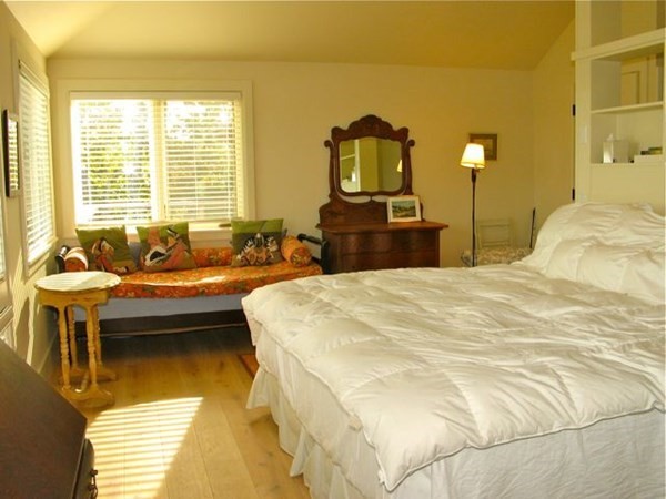 60 Witchwood Lane Edgartown, MA 02539 - Photo 10 of 32 a bedroom with a bed and wooden floor