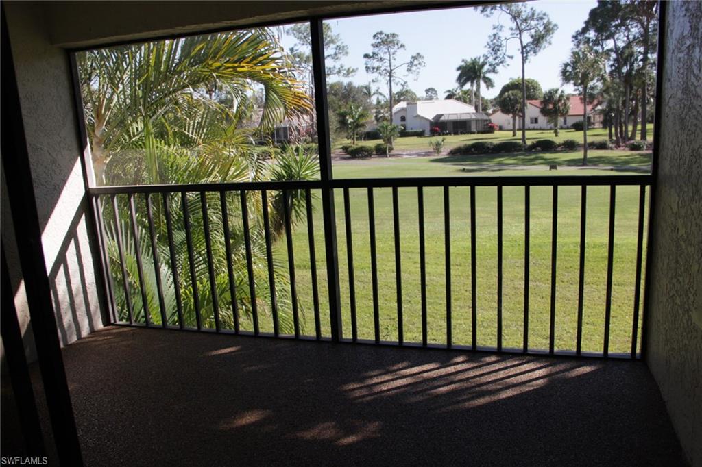 5841 Rattlesnake Hammock Road, Unit I206 Naples, FL 34113 - Photo 19 of 24 a view of a street from a balcony