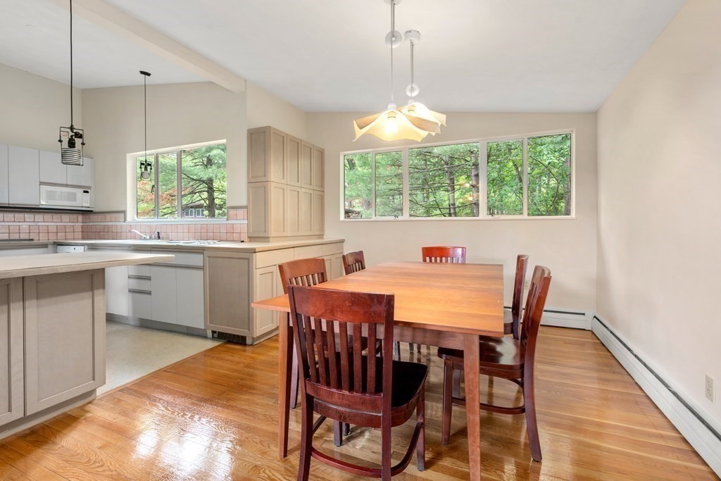 32 Peacock Farm Road Lexington, MA 02421 - Photo 3 of 16 a view of a dining room with furniture window and outside view