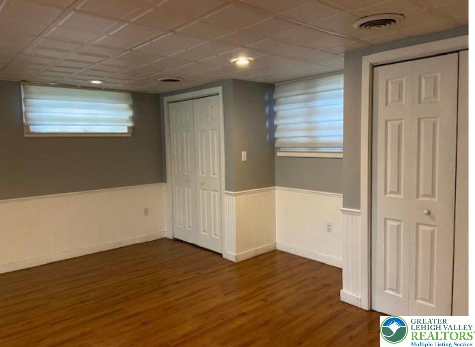 2700 Van Buren Road Easton, PA 18045 - Photo 13 of 21 a view of an empty room with wooden floor and a window