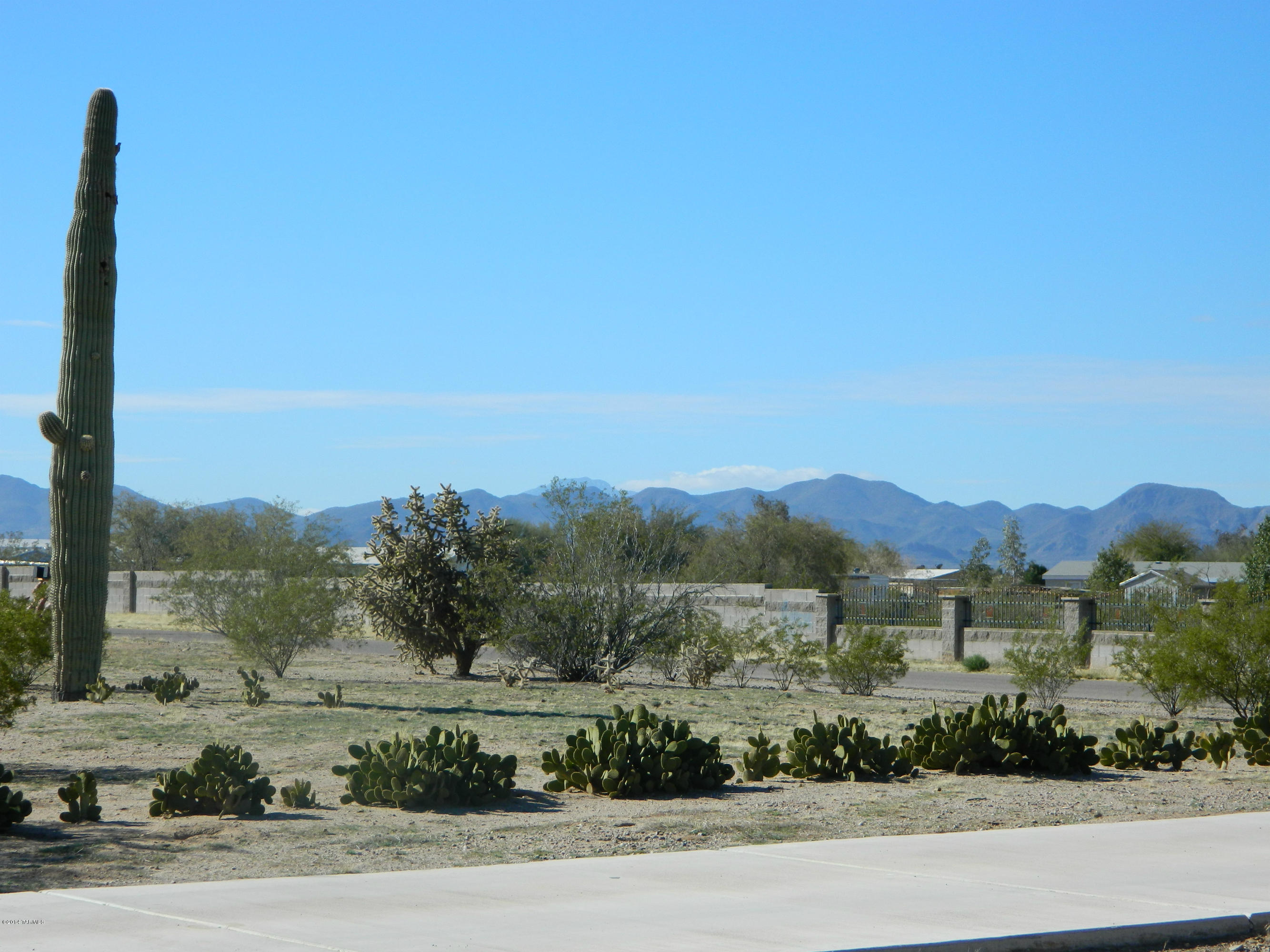 5204 North Puma Road Marana, AZ 85653 - Photo 4 of 36 a view of a city with a mountain