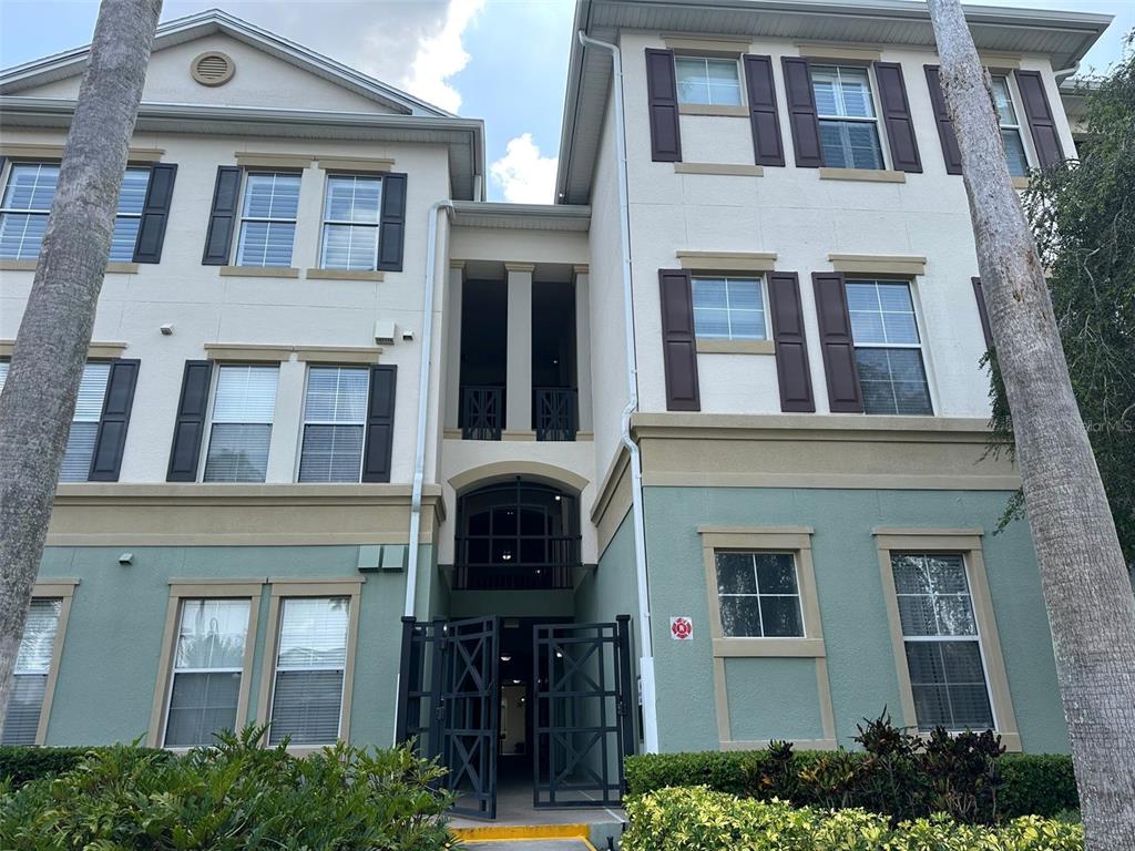 a front view of a multi story residential apartment building