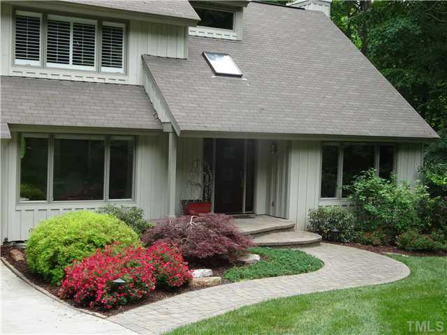 5972 Dunbarton Way Raleigh, NC 27613 - Photo 3 of 25 Lush landscaping, walkways made of pavers and landscape lighting add to the exterior beauty of this home. Exterior Front