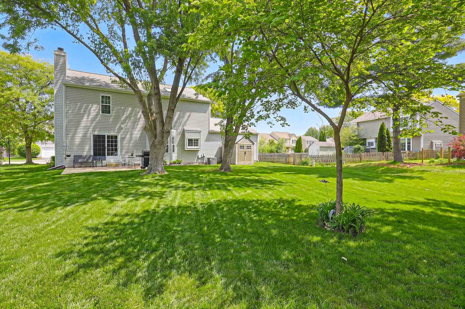 830 Hawk Lane Carol Stream, IL 60188 - Photo 30 of 30 a house view with swimming pool in front of it