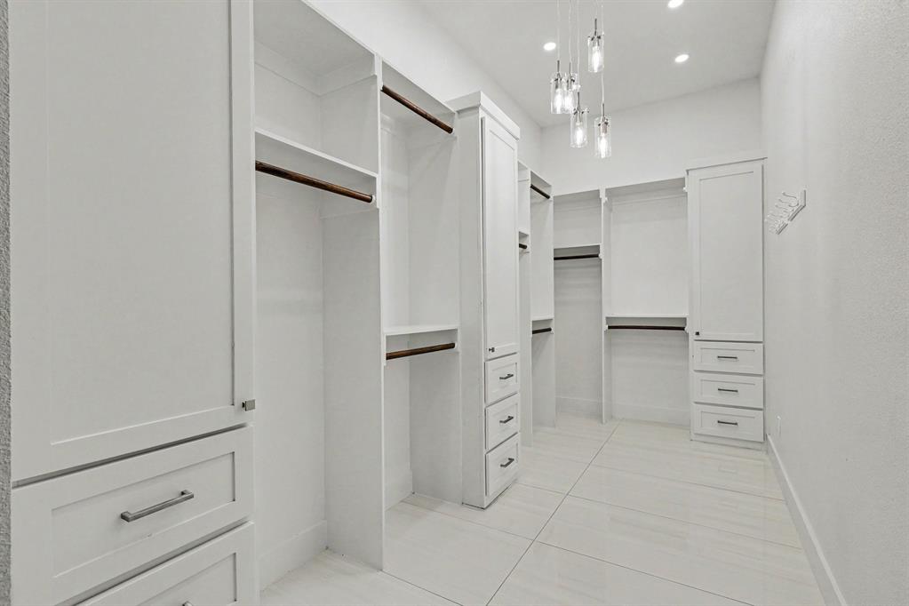 17327 Davenport Road Dallas, TX 75248 - Photo 28 of 40 a view of walk in closet