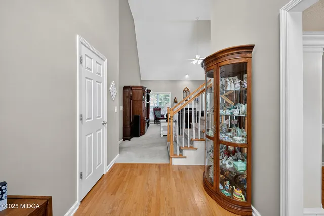 a view of entryway with wooden floor