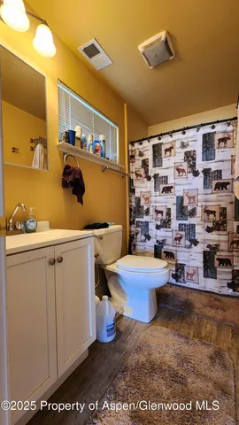 a backyard of a house with seating space