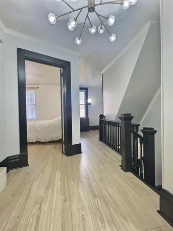 a view of gallery with wooden floor