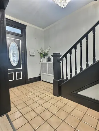 a bedroom with a bed and a lamp on table