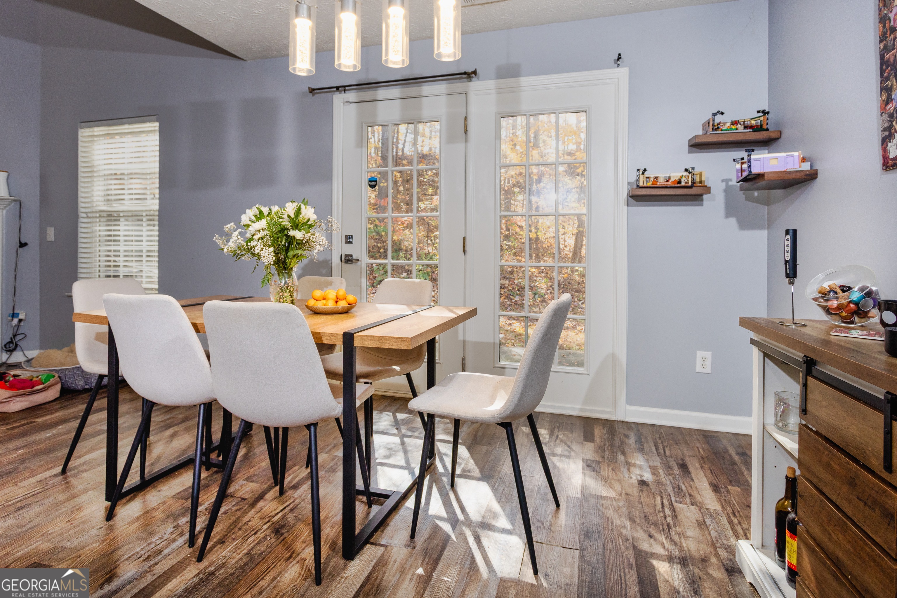 269 Silver Ridge Drive, Unit 269 Dallas, GA 30157 - Photo 17 of 34 a view of a dining room with furniture and chandelier