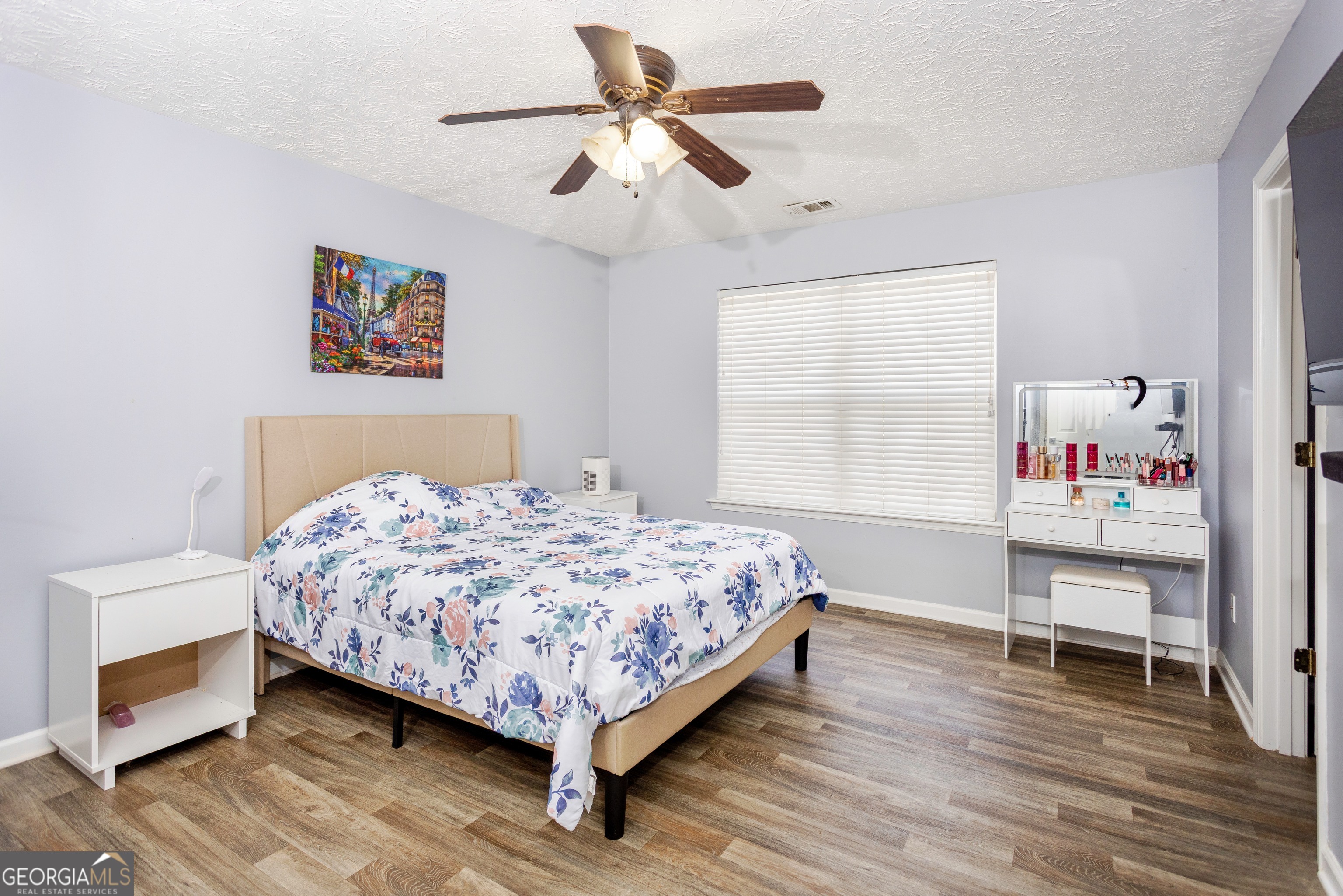 269 Silver Ridge Drive, Unit 269 Dallas, GA 30157 - Photo 21 of 34 a bedroom with a bed and a bookshelf