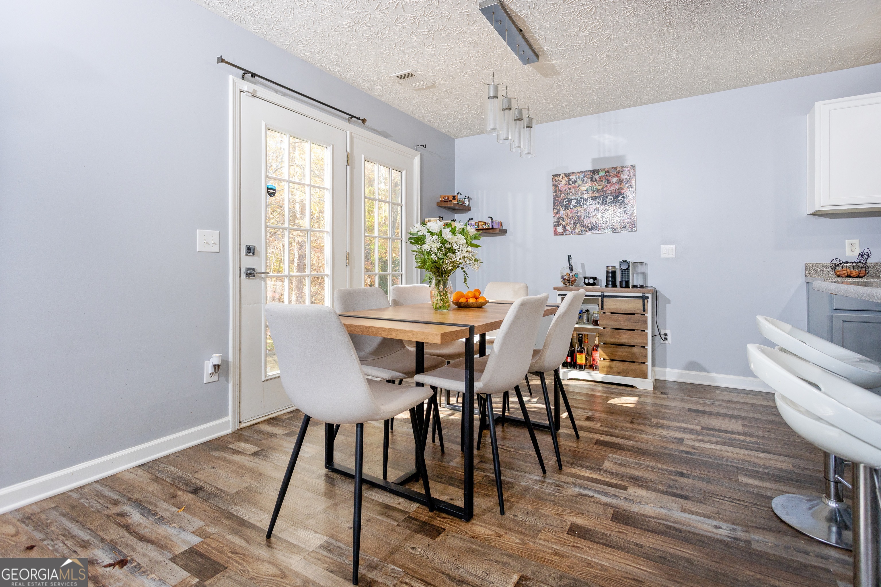 269 Silver Ridge Drive, Unit 269 Dallas, GA 30157 - Photo 10 of 34 a view of a dining room with furniture and wooden floor