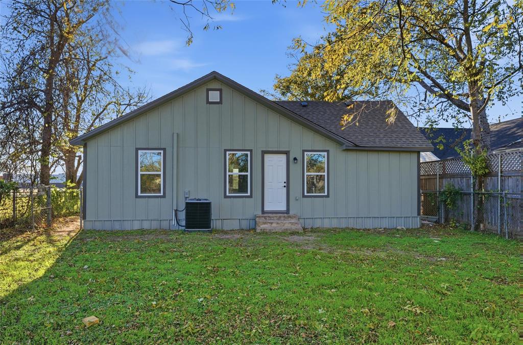 803 Garrison Street Waco, TX 76704 - Photo 15 of 16 a house that is sitting in the grass