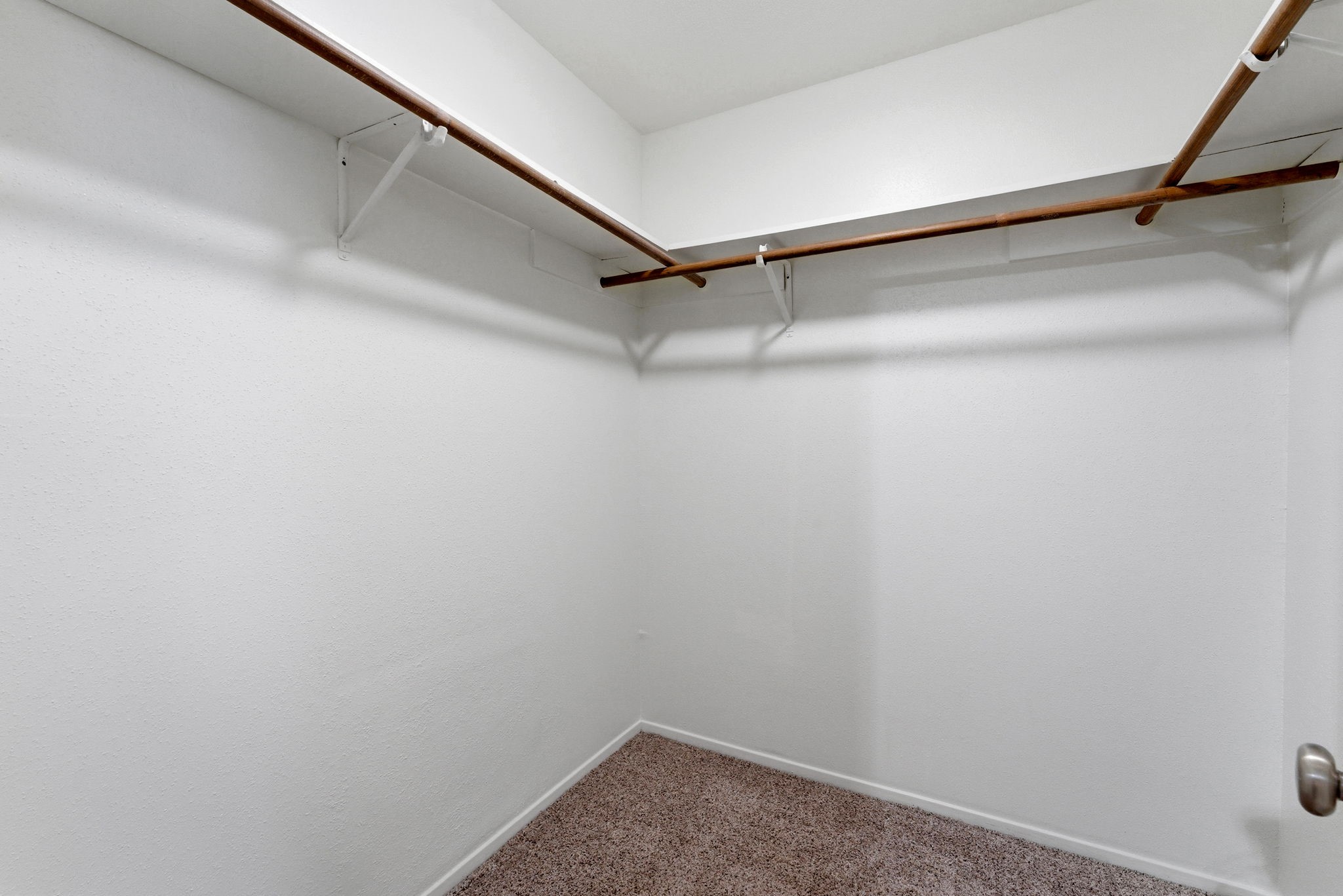 21514 Slippery Creek Lane Spring, TX 77388 - Photo 17 of 27 a view of a room with racks on the wall