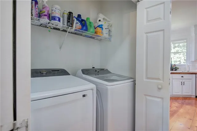 a bathroom with a tub and shower