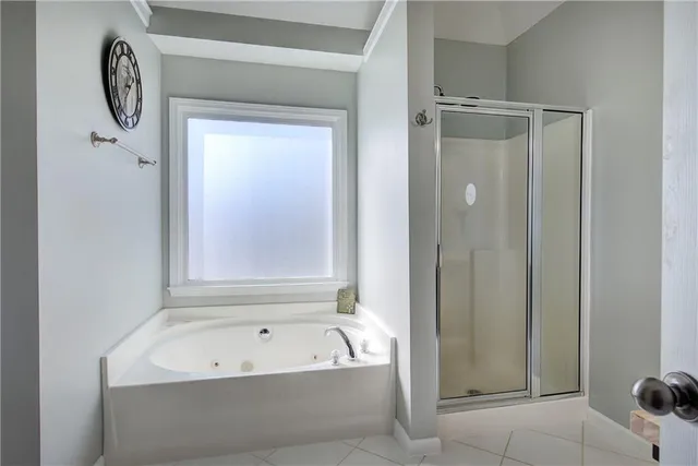 a view of staircase with wooden floor and white walls