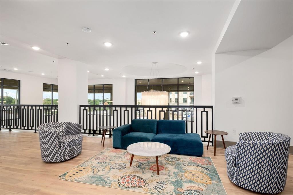 2700 Old Denton Road, Unit 3370 Carrollton, TX 75007 - Photo 3 of 9 a bedroom with furniture and a rug