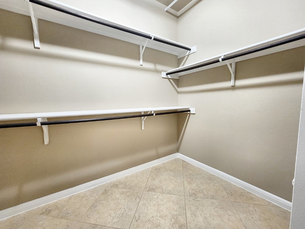 7508 Colina Vista Loop, Unit B Austin, TX 78750 - Photo 24 of 40 a view of a room with shelf