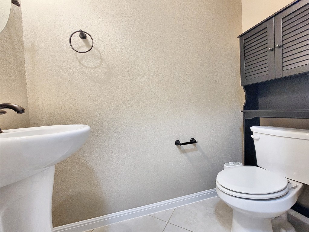 7508 Colina Vista Loop, Unit B Austin, TX 78750 - Photo 31 of 40 a bathroom with a sink and a toilet