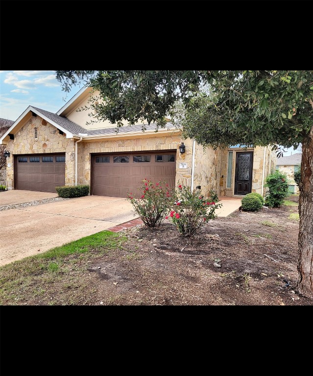 7508 Colina Vista Loop, Unit B Austin, TX 78750 - Photo 34 of 40 a view of a house with backyard and garden