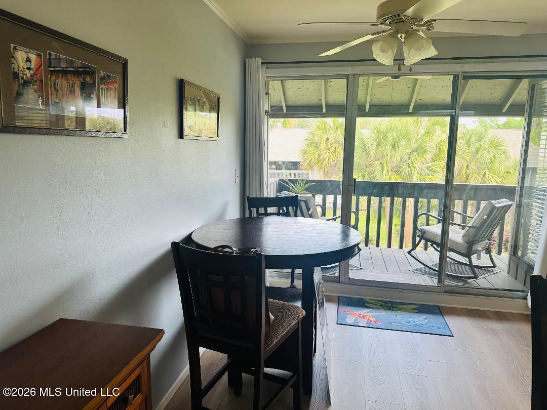 232 Lanai, Unit J Diamondhead, MS 39525 - Photo 5 of 14 thumbnail Table area