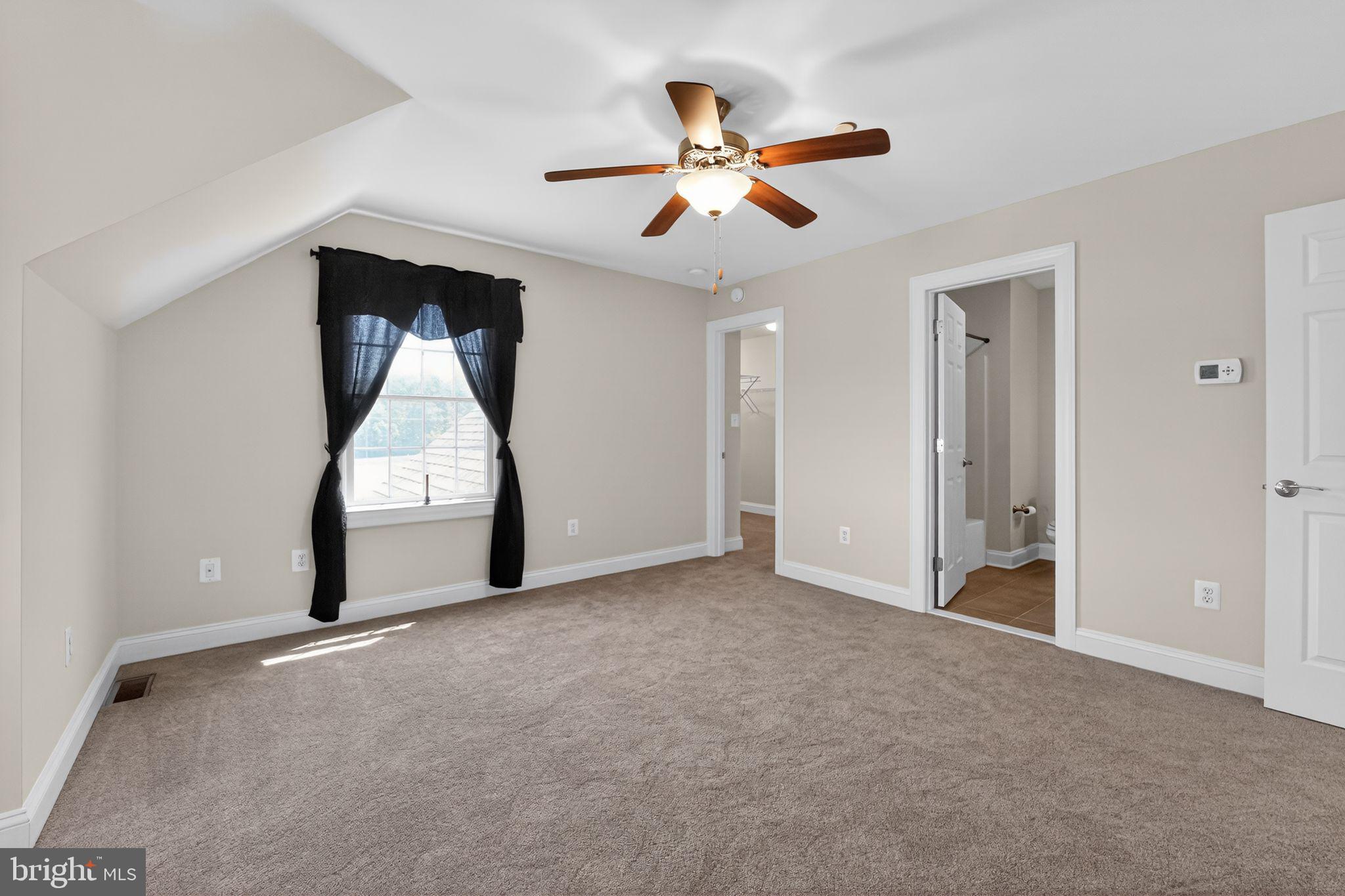 1165 Line Road Westminster, MD 21158 - Photo 29 of 75 a view of a livingroom with a ceiling fan and wooden floor