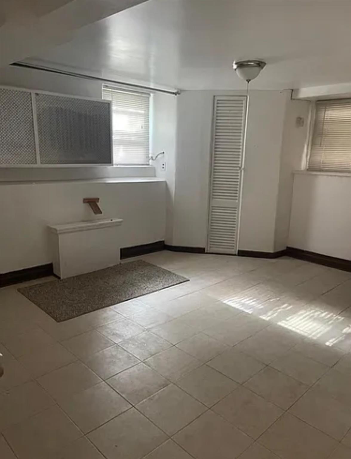 2564 Paulding Avenue Bronx, NY 10469 - Photo 12 of 14 Bathroom with baseboards
