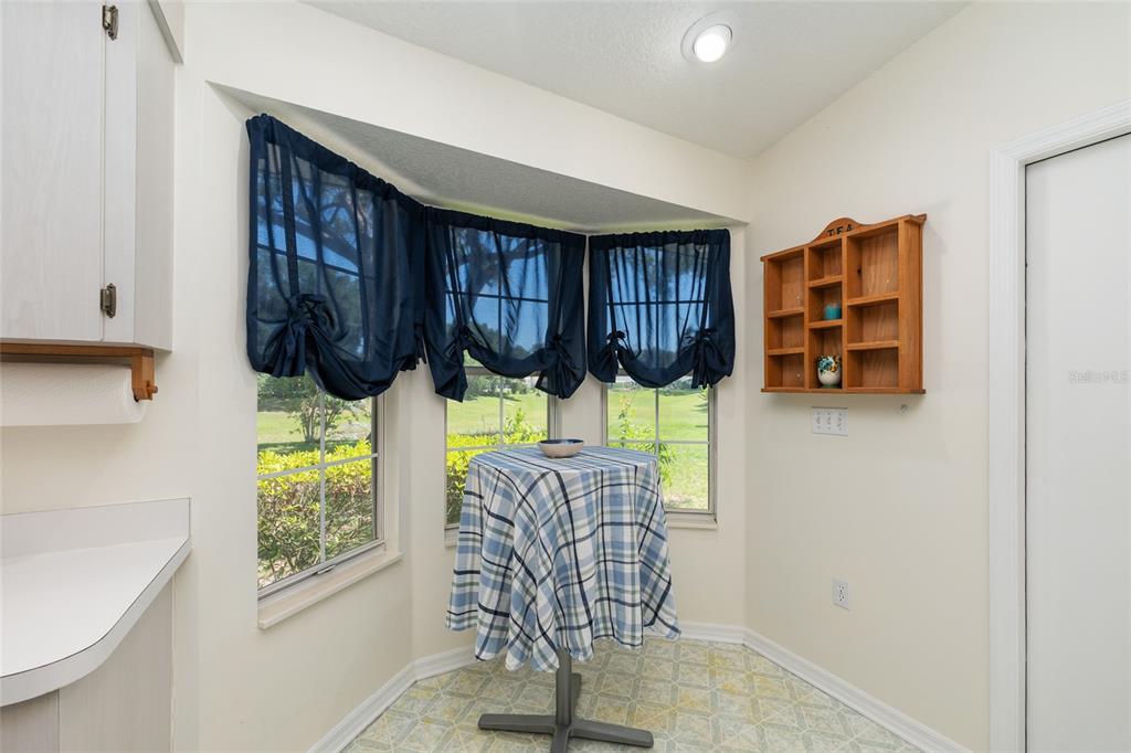 8038 Southwest 108th Loop Ocala, FL 34481 - Photo 16 of 48 a room with furniture and window