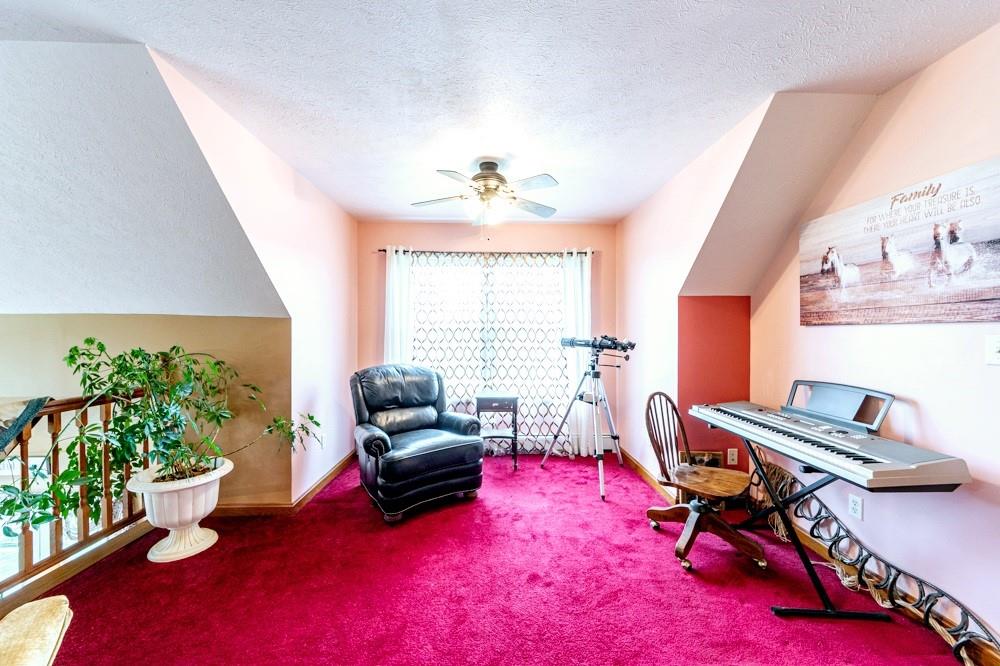11 Fairgrounds Road Stoneboro, PA 16153 - Photo 13 of 37 a living room with furniture and a potted plant
