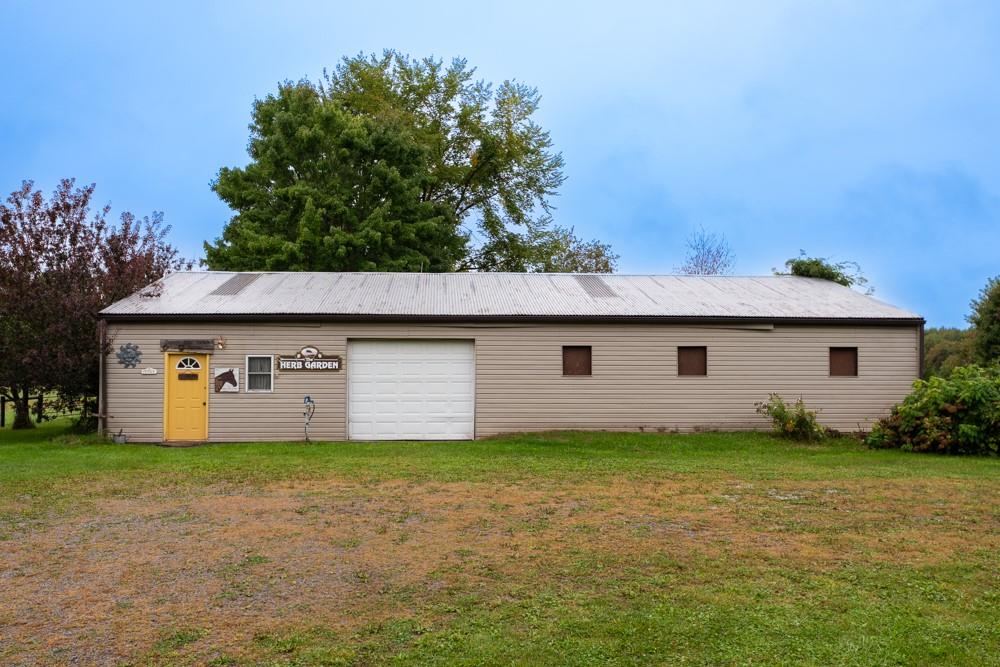 11 Fairgrounds Road Stoneboro, PA 16153 - Photo 18 of 37 a front view of house with yard and trees