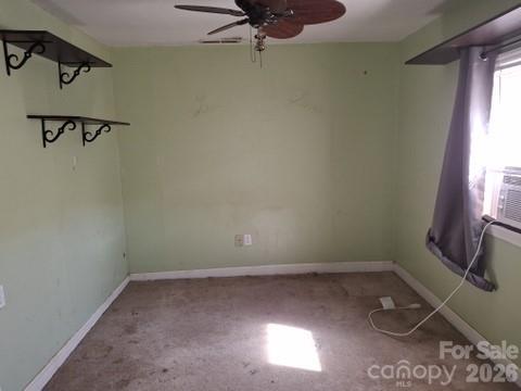 129 Harrison Street Swannanoa, NC 28778 - Photo 12 of 17 a view of a room with rack on the wall and a window