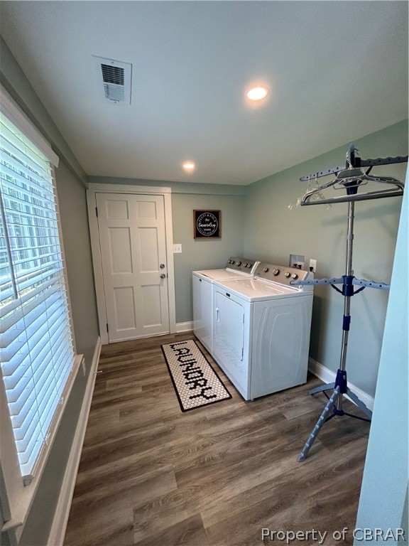1438 Lafayette Road Gloucester Point, VA 23062 - Photo 23 of 34 Laundry room featuring hookup for a washing machine, dark wood-type flooring, and washing machine and dryer