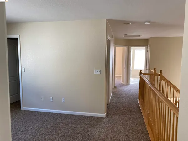 a view of a hallway with a closet