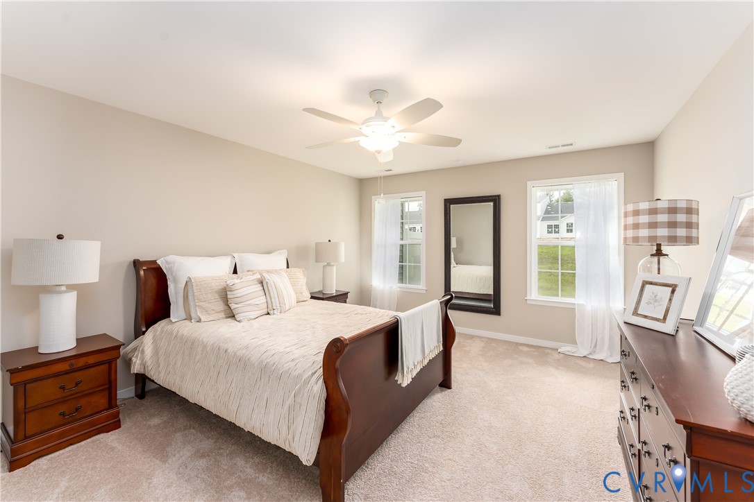 140 Wendenburg Court, Unit F6 Aylett, VA 23009 - Photo 20 of 33 Bedroom featuring light carpet and ceiling fan