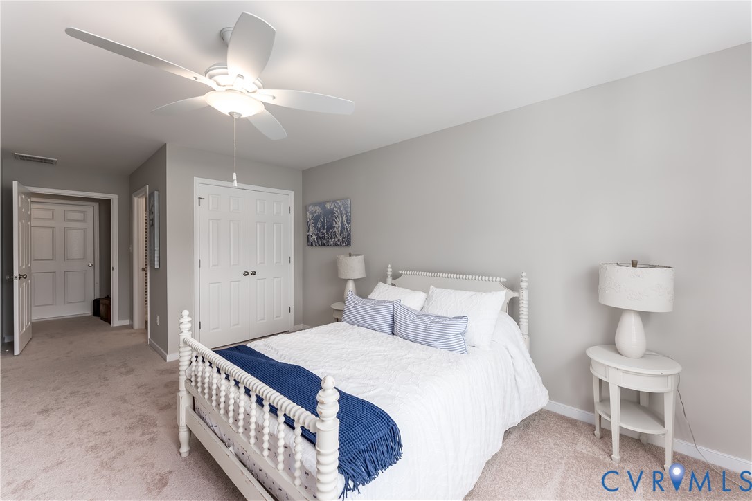 140 Wendenburg Court, Unit F6 Aylett, VA 23009 - Photo 26 of 33 Bedroom featuring light carpet, a ceiling fan, and